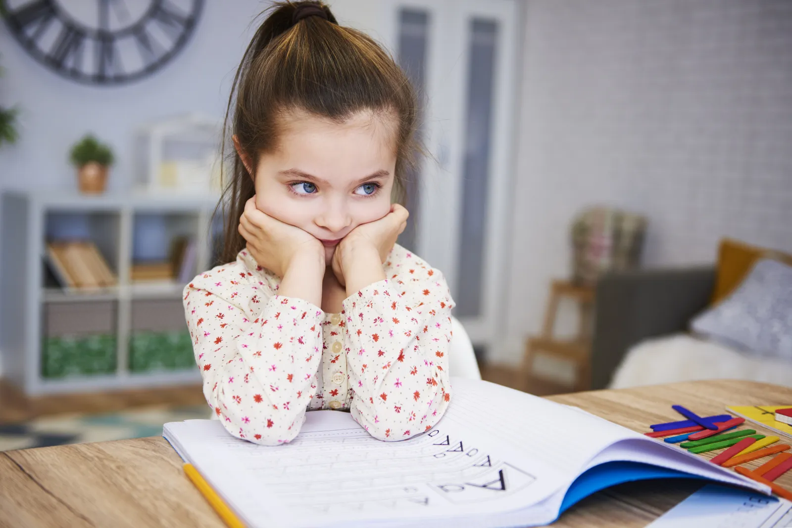 How can I tell if my child is avoiding writing out of defiance or genuine struggle?