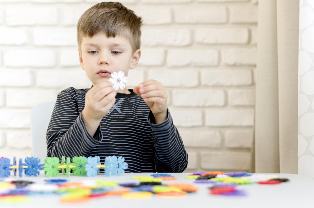 Young boy showing nonverbal signs – autism and speech delay in children